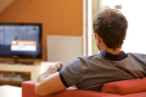 Man-Watching-TV-Hilton